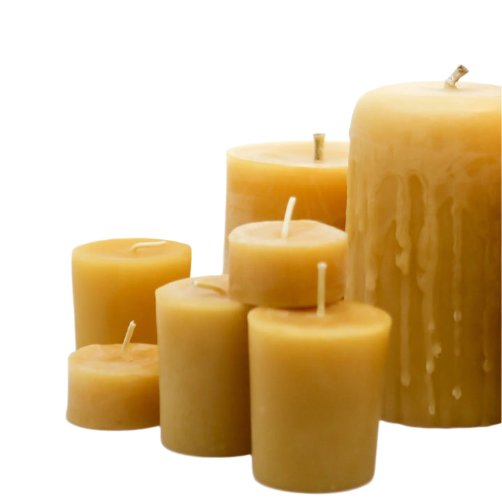 group of beeswax tea lights, votives and pillar candles